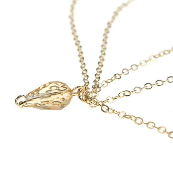 Haarketting goudkleurig met steen strass